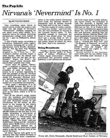 Recorte del New York Times con el titular "Nirvana's Nevermind Is No. 1" y una foto de la banda